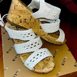 Girls wedge sandals size 3, worn once. Excellent condition.